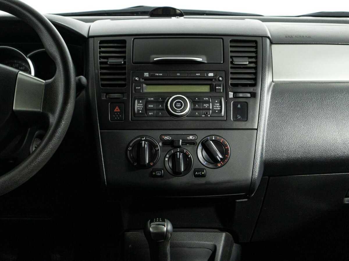 Nissan Tiida с пробегом — 2013 год. Фото: #13