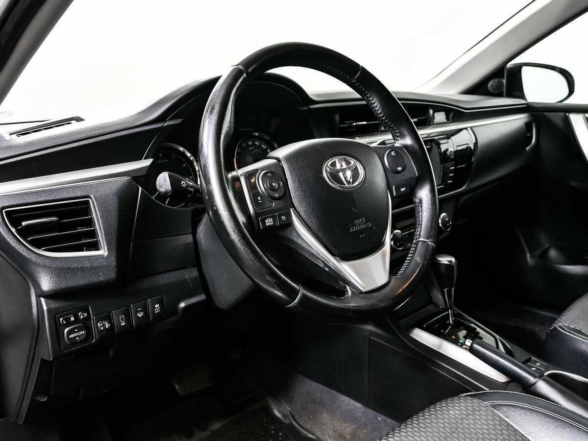 Toyota Corolla с пробегом — 2013 год. Фото: #11