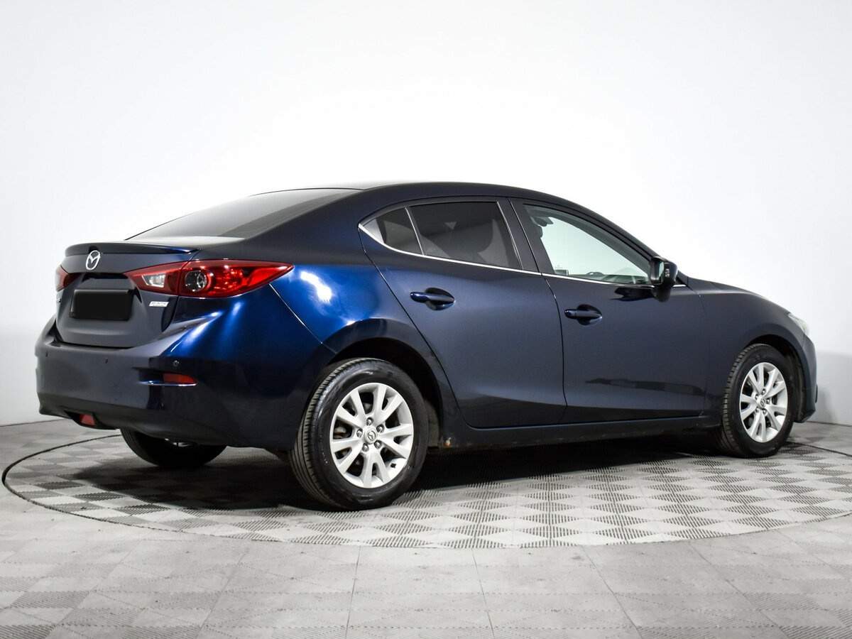 Mazda 3 с пробегом — 2014 год. Фото: #4
