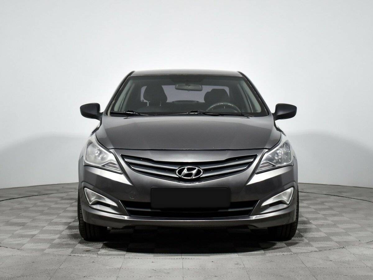 Hyundai Solaris с пробегом — 2014 год. Фото: #1