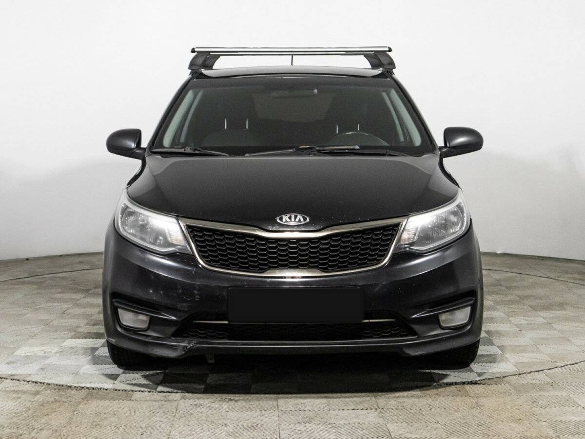 Kia Rio с пробегом — 2015 год. Фото: #1