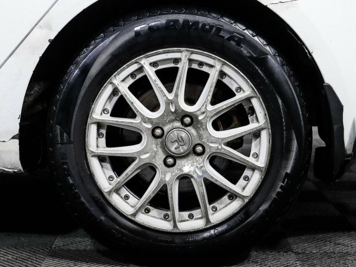 Kia Rio с пробегом — 2013 год. Фото: #6