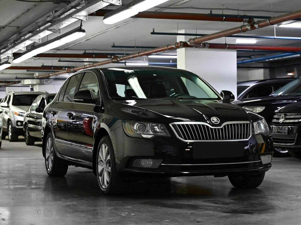 Skoda Superb с пробегом — 2013 год. Фото: #1