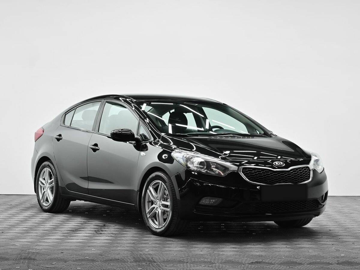 Kia Cerato с пробегом — 2015 год. Фото: #1