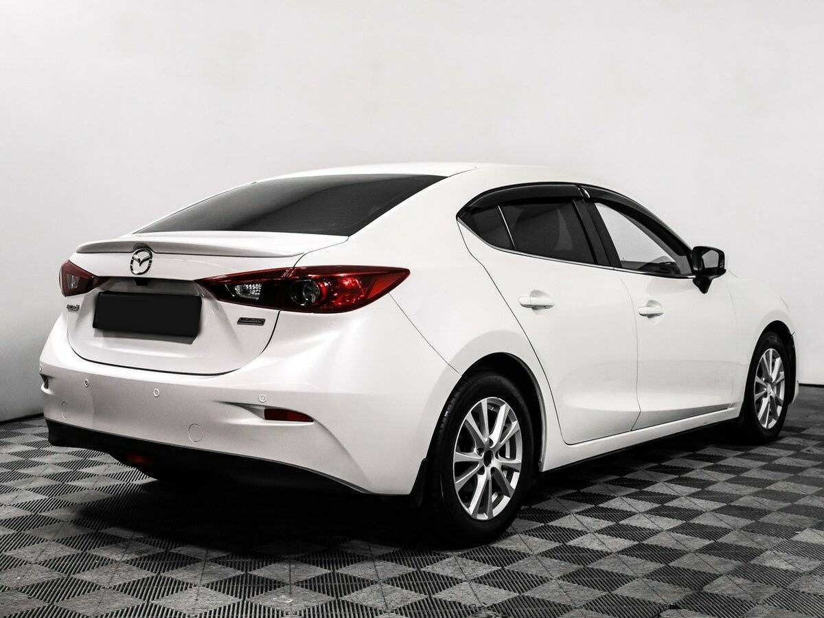 Mazda 3 с пробегом — 2014 год. Фото: #4