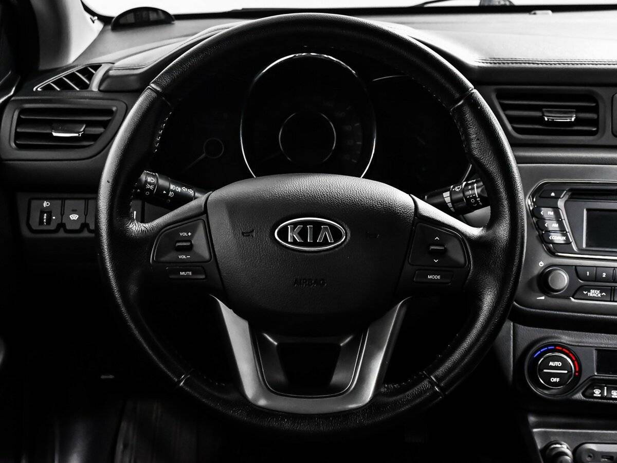 Kia Rio с пробегом — 2012 год. Фото: #11