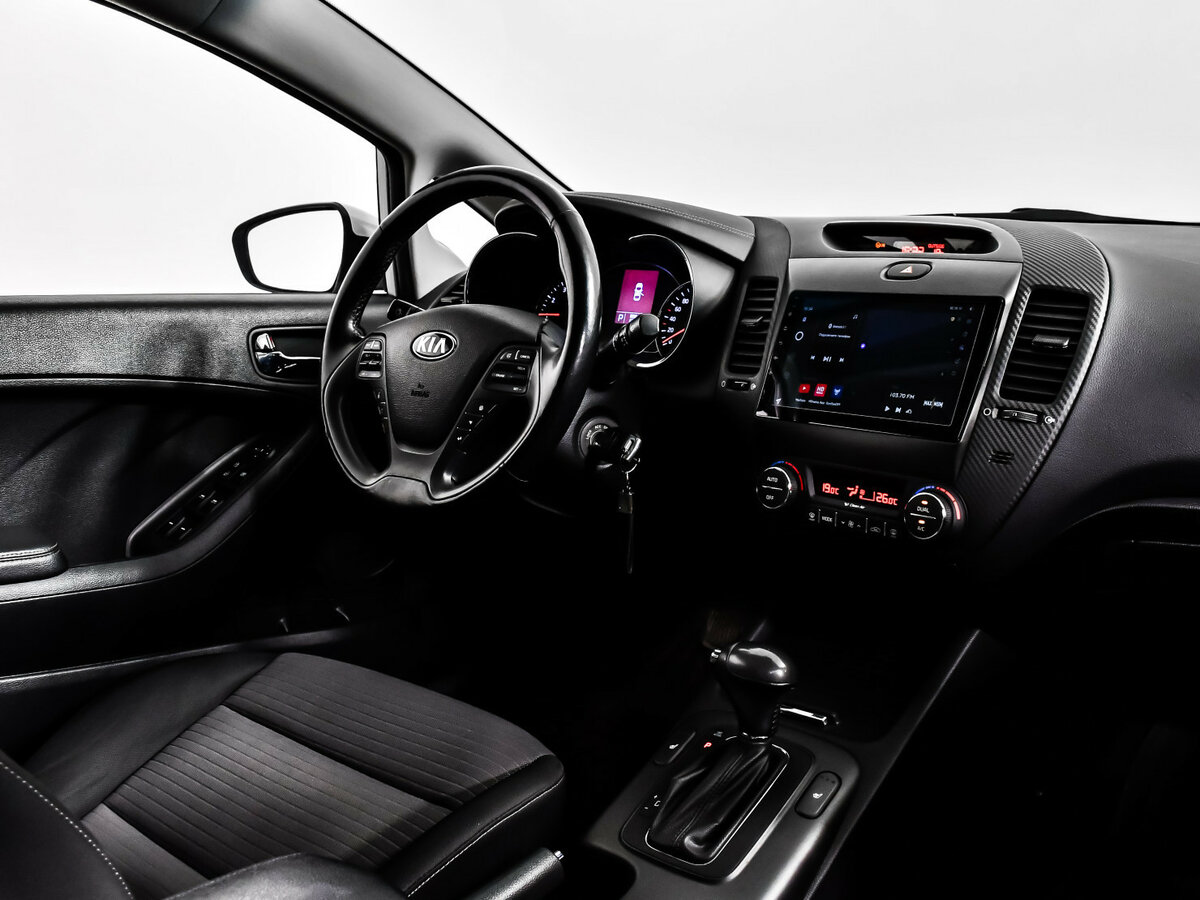 Kia Cerato с пробегом — 2013 год. Фото: #10