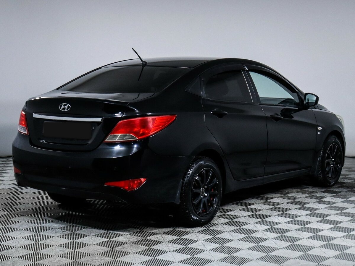 Hyundai Solaris с пробегом — 2015 год. Фото: #3