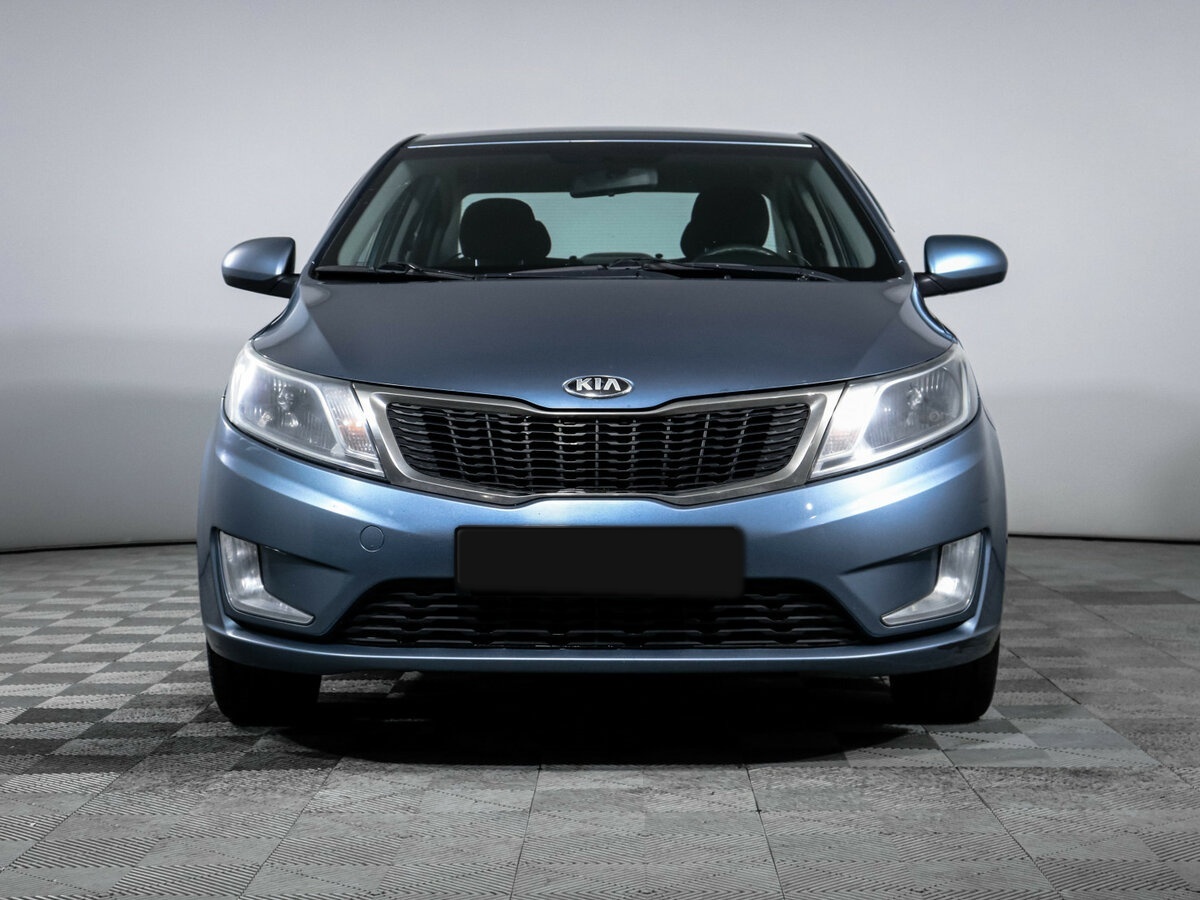 Kia Rio с пробегом — 2013 год. Фото: #1