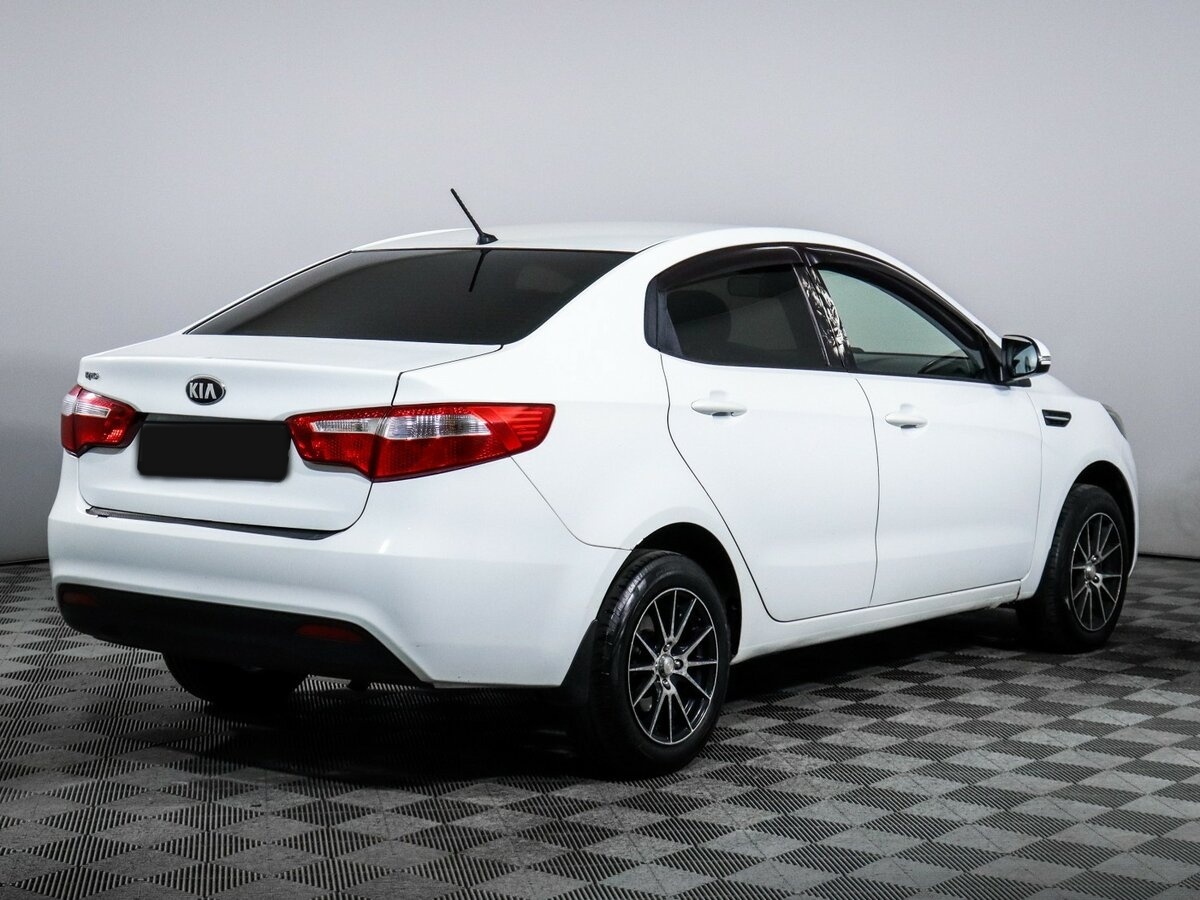 Kia Rio с пробегом — 2013 год. Фото: #3