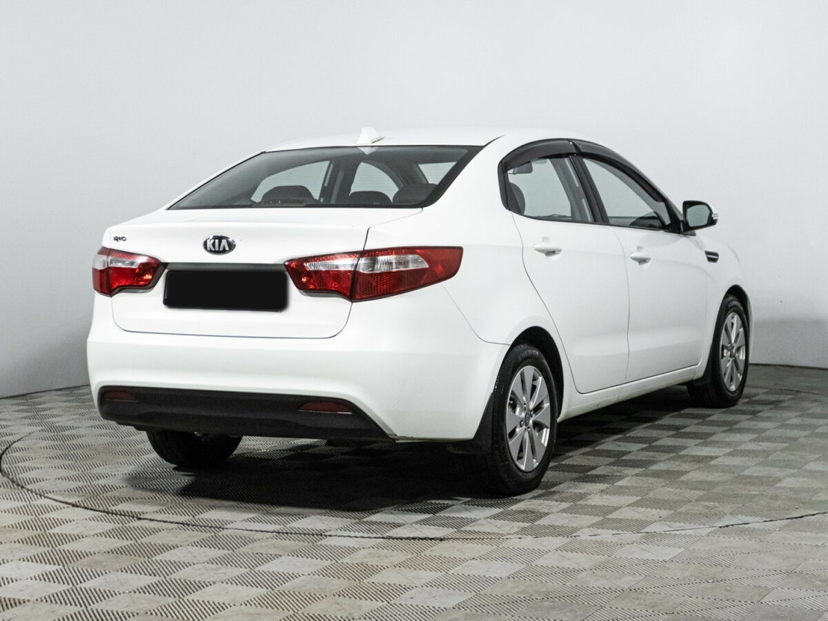 Kia Rio с пробегом — 2013 год. Фото: #4