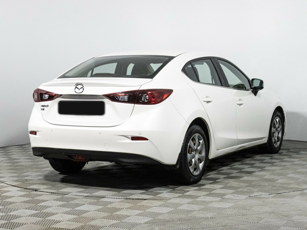Mazda 3 с пробегом — 2014 год. Фото: #4