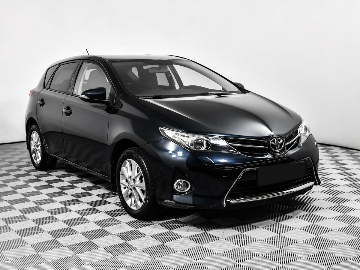 Toyota Auris с пробегом — 2014 год. Фото: #2