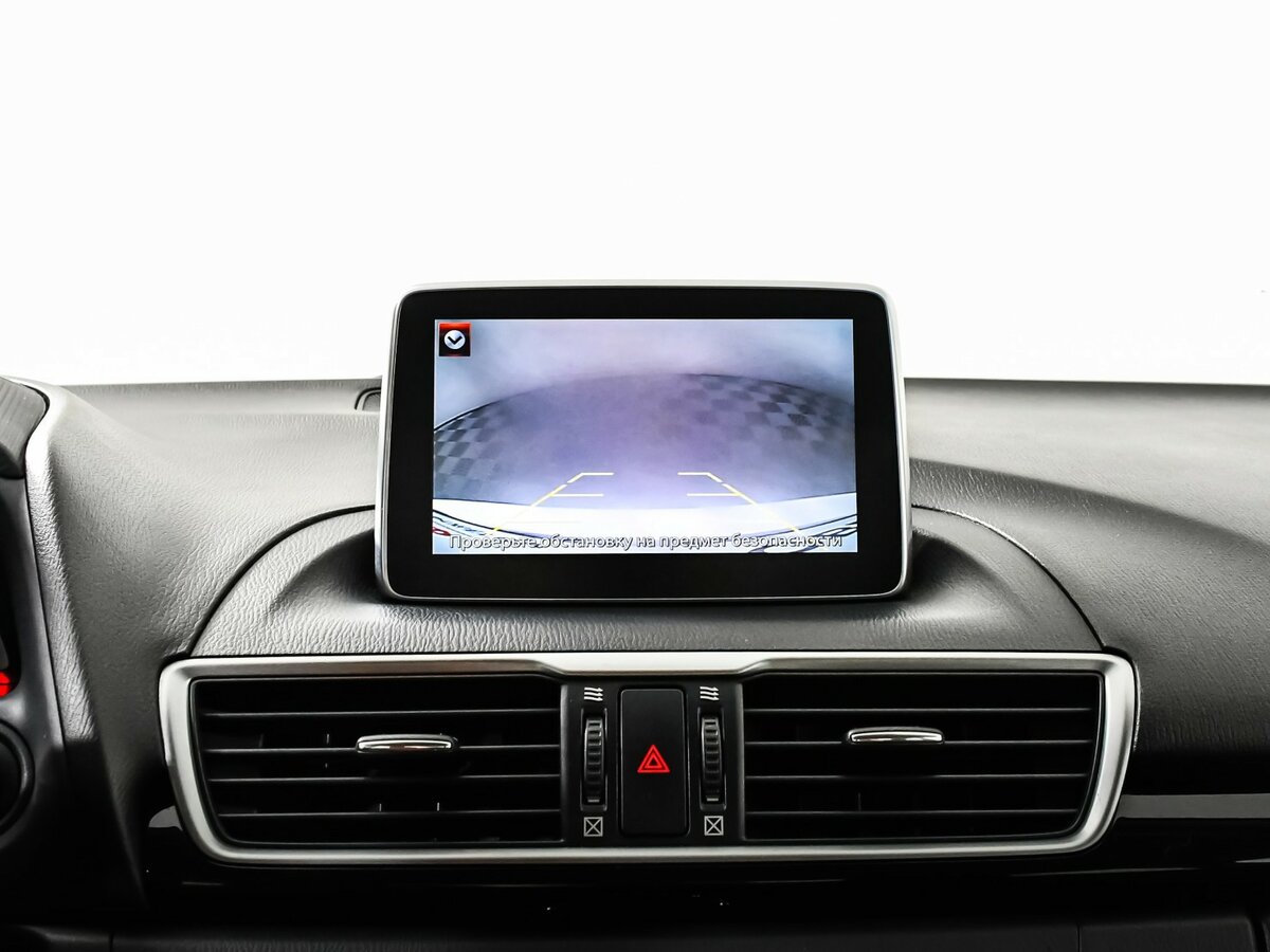 Mazda 3 с пробегом — 2014 год. Фото: #13