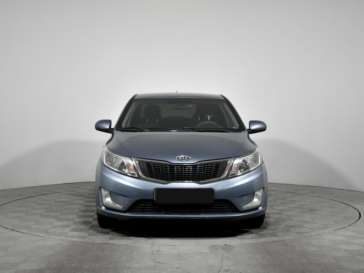 Kia Rio с пробегом — 2012 год. Фото: #1